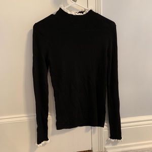 Sweater with ruffle trim